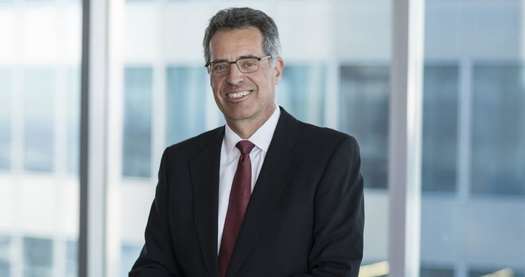 Bill Nygren portrait in front of the window