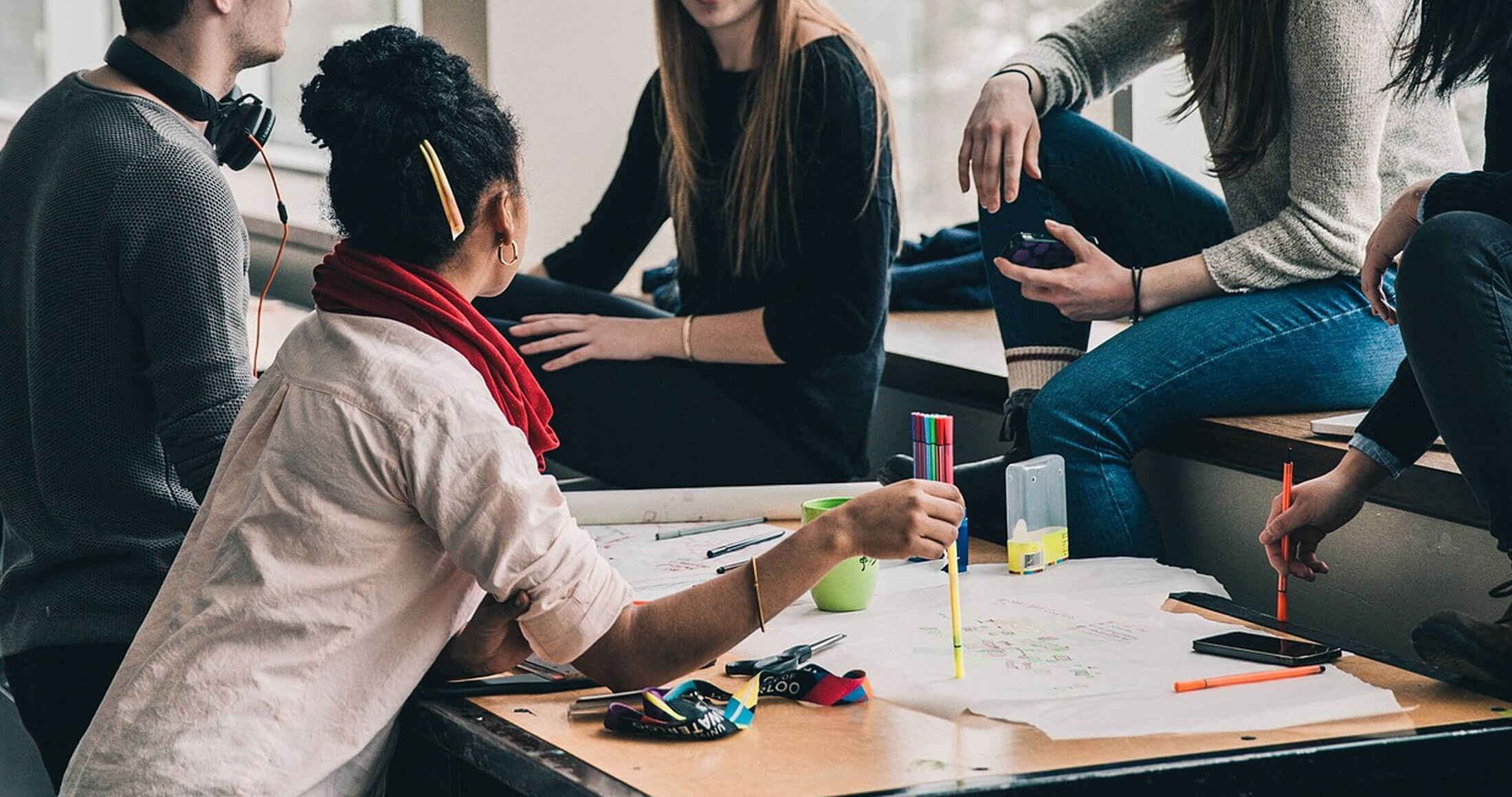 Young people working together at a table